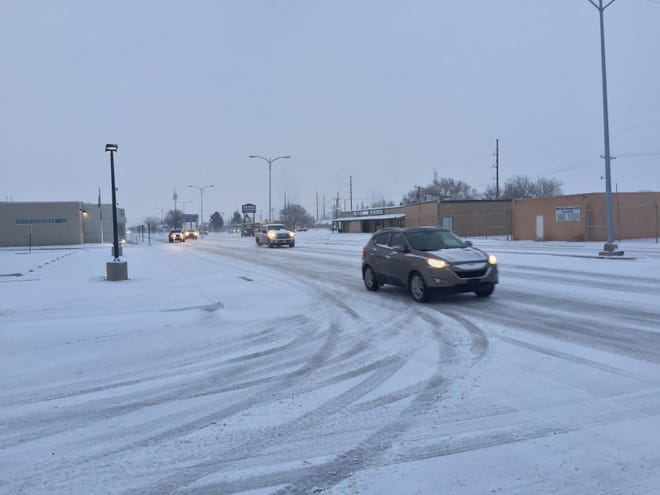 Drivers navigated snowy roads in Eddy County on Feb. 18, 2021. The National Weather Service said four inches of snow was possible.