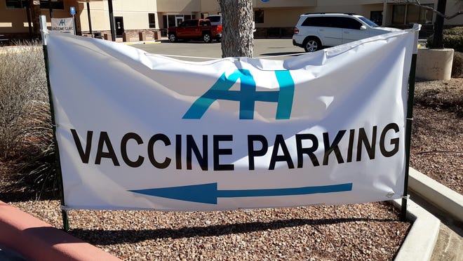 A banner at Artesia General Hospital shows where people can park before getting the COVID-19 vaccine. A community wide clinic was held in Carlsbad March 1, 2021 and more than 500 people received the vaccine.