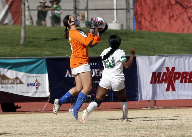 Carlsbad goalie Korrine Bradford makes one of her saves in the final two minutes of the Class 5A state championship girls soccer game against Albuquerque on April 10, 2021. Carlsbad won, 1-0 and finished the season a perfect 11-0.