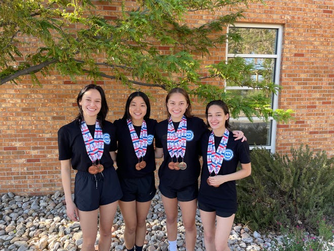 Carlsbad's Isabella Corder, Zöe Char, Sophia Corder and Emily Dostal display their medals won at the 2021 NMAA State Swimming & Diving Championship at Albuquerque on May 13, 2021. These four swimmers finished in eighth place out of 25 teams, finishing in the Top-6 of every race they competed in.