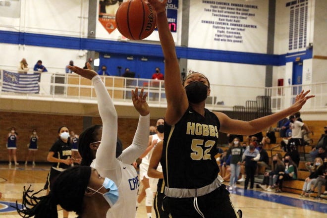 Hobbs freshman Aniya Joseph blocks a shot against the Carlsbad Cavegirls in their game on March 20, 2021. Carlsbad was scheduled to face Hobbs on Friday but had to cancel the game due to a Cavegirl testing positive for COVID-19 Friday morning.