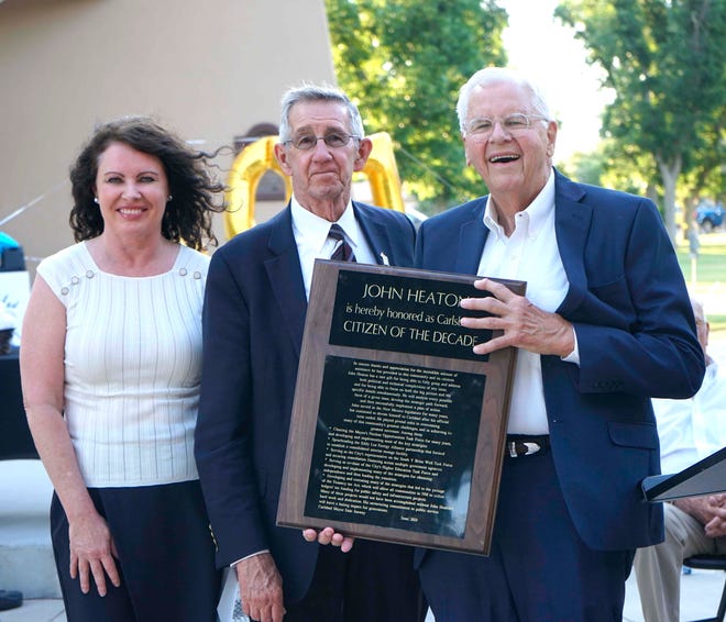 John Heaton (right) is presented with the Citizen of the Decade award by Carlsbad Mayor Dale Janway (center) and Deputy City Administrator Wendy Austin during the Spirit of Carlsbad award ceremony, June 17, 2021 at the Carlsbad Beach Band Shell.