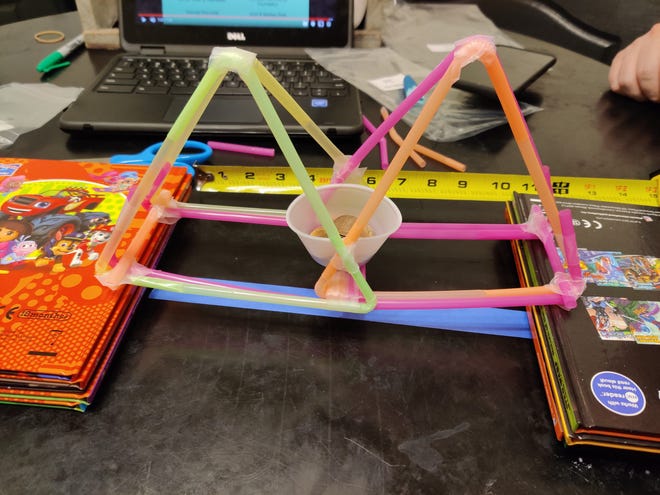 Participants learned about physics in the bridge building challenge during the Inspired by Science 2020 summer camp.