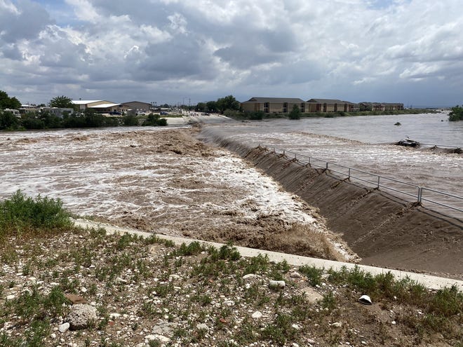 Flooding of Dark Canyon at San Jose Blvd on June 29 closes the intersection and causes flooding of Pecos River in Carlsbad.