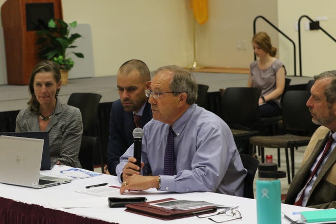 Michael Hightower (center) speaks to a group of New Mexico lawmakers about oil and gas wastewater, July 14, 2021 at New Mexico State University Carlsbad.