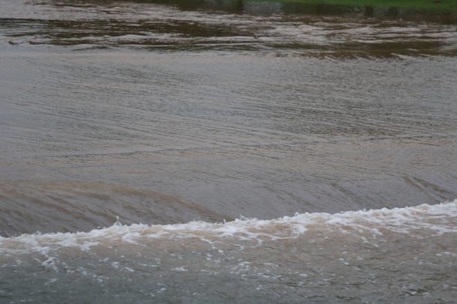 Flood waters drift down the Eagle Draw flood channel in Artesia on the morning of June 29, 2021. A flash flood watch was posted until 6 p.m.