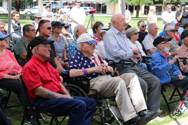 Surviving Carlsbad WW II members listen to speeches on July 3, 2021 in a ceremony honoring their service.