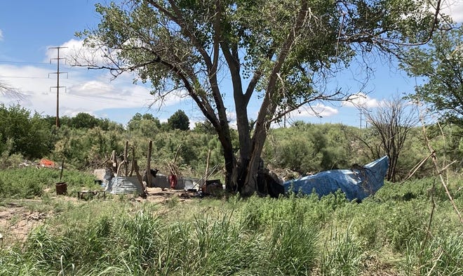 A homeless encampment was destroyed after the Lower Transill Dam overflowed in Carlsbad, New Mexico. Residents of the camp say they had just minutes to evacuate before their belongings were swept away by the flood.
