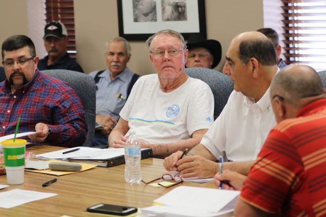 Members of the Carlsbad Irrigation District board hold a meeting, March 11, 2020 in Carlsbad.
