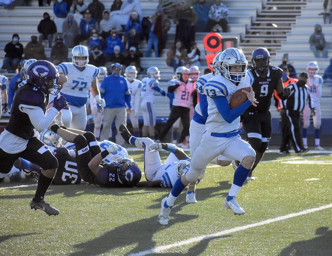 Carlsbad quarterback Dane Naylor finds daylight on a 34-yard touchdown run in the second quarter of Saturday's game at Leon Williams Stadium in Clovis. Naylor rushed for 104 yards in the 55-20 defeat.