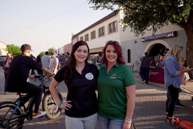 Kat Davis (left) executive director of the Pearl of the Pecos Arts and Cultural District and Ashly Olsen, executive director of Carlsbad MainStreet during a Farmers' Market Third Thursday event in May, 2021.