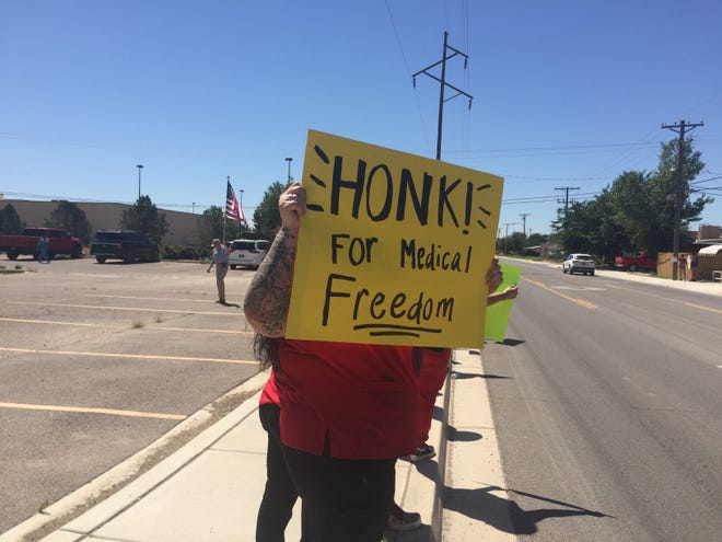 Residents in Artesia joined residents in Las Cruces and Albuquerque on Wednesday, Aug. 25, 2021 to protest against healthcare worker COVID-19 vaccinations enacted by the state of New Mexico.