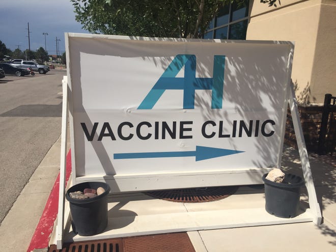 A sign at Artesia General Hospital points the way to a COVID-19 vaccine clinic. As of Aug. 23, 2021, New Mexico Department of Health reported 154 COVID-19 deaths in Eddy County.