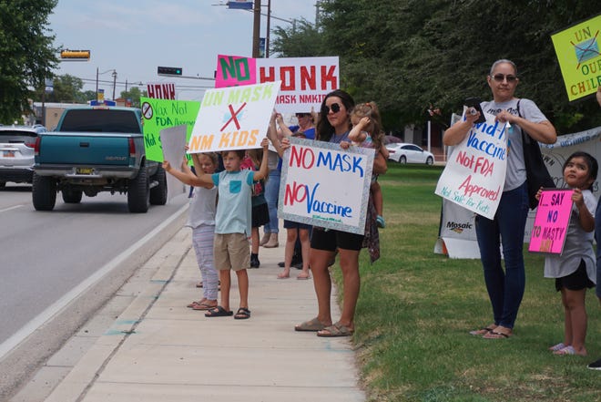 Parents and children gathered outside the 5th Judicial District Court in Eddy County to protest the New Mexico Public Education Department's guidelines for masks in schools.