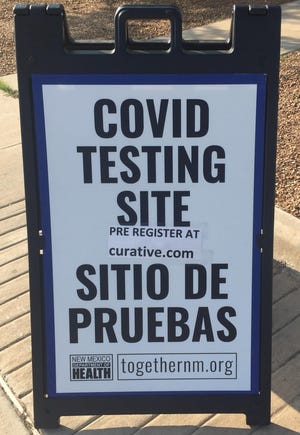 A sign at the Eddy County Public Health Office in Artesia reminds people drive thru COVID-19 testing was available on Aug. 5, 2021.