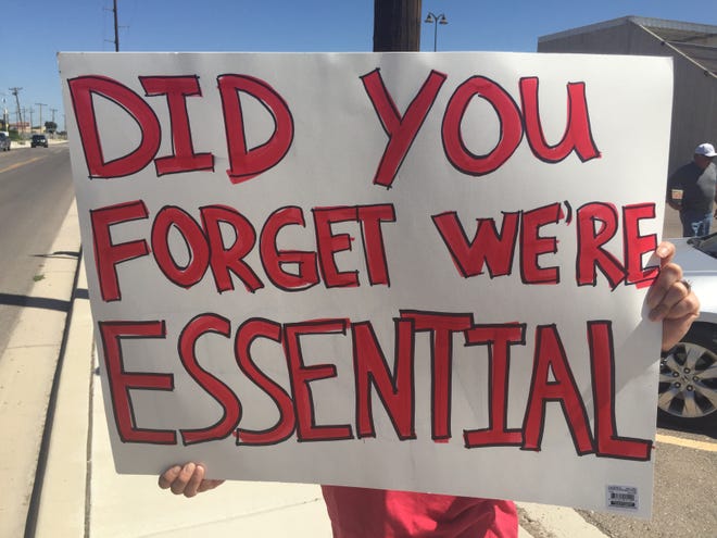 Residents gather in Artesia on Wednesday, Aug. 25, 2021 to protest against healthcare vaccination mandates enacted by Gov. Michelle Lujan Grisham.