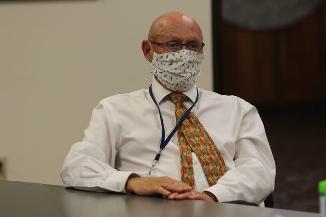 Carlsbad Municipal Schools Superintendent Gerry Washburn discusses the COVID-19 pandemic with Lt. Gov. Howie Morales, Nov. 10, 2020 in district's administration building.