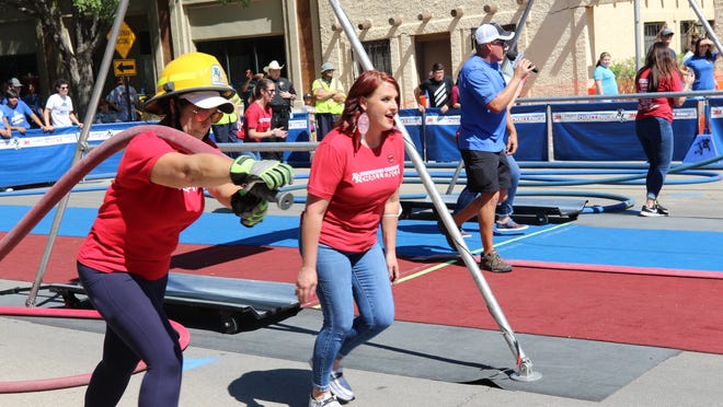 Competition fires up at Carlsbad’s downtown Firefighter Combat Challenge