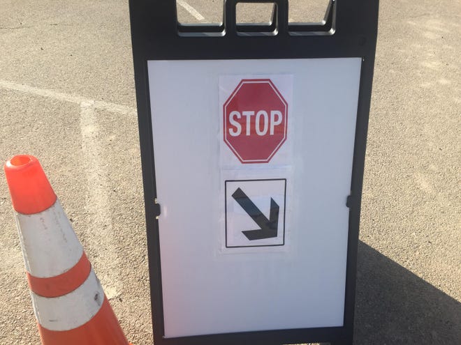 A sign at the Eddy County Public Health Office in Artesia indicated a stopping point for drive-thru COVID-19 vaccination seekers on Sept. 23, 2021.